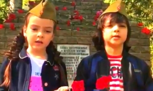 Дети Филиппа Киркорова встретили День Победы на одной трибуне с Путиным
