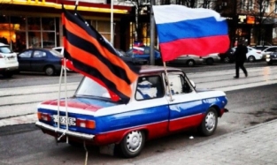 Омичи выстроят автомобили в триколор России